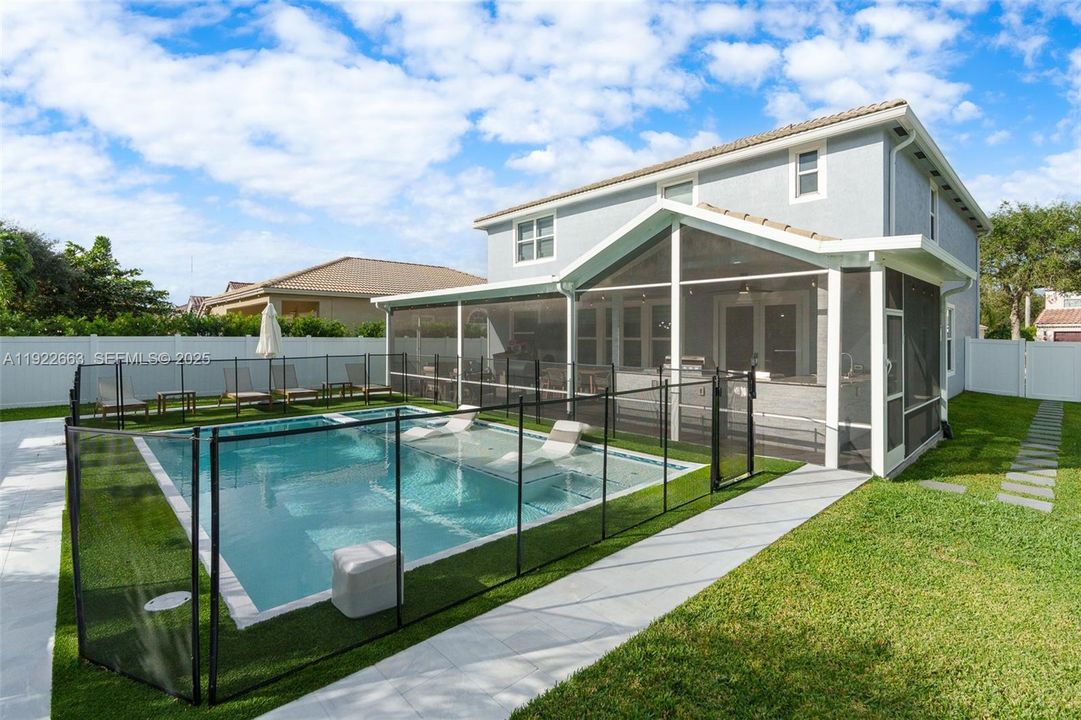 artificial turf surrounds pool