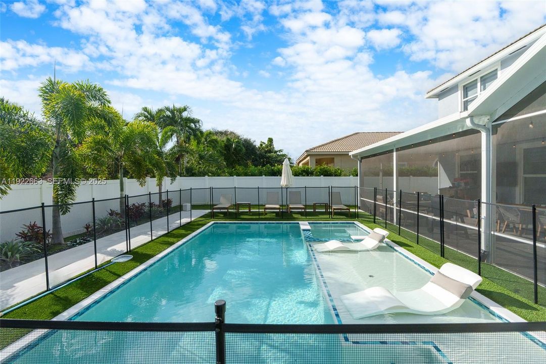 artificial turf surrounds pool
