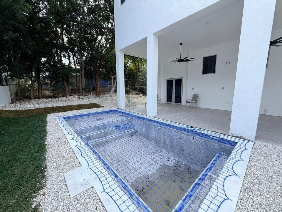 12x24 Pool with Sun Deck and Bench Seating