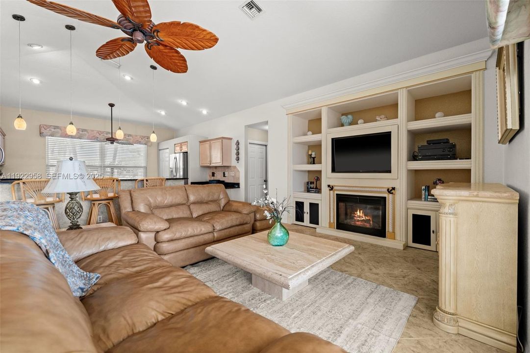 Living Room with built in bookcase and Electric Fireplace