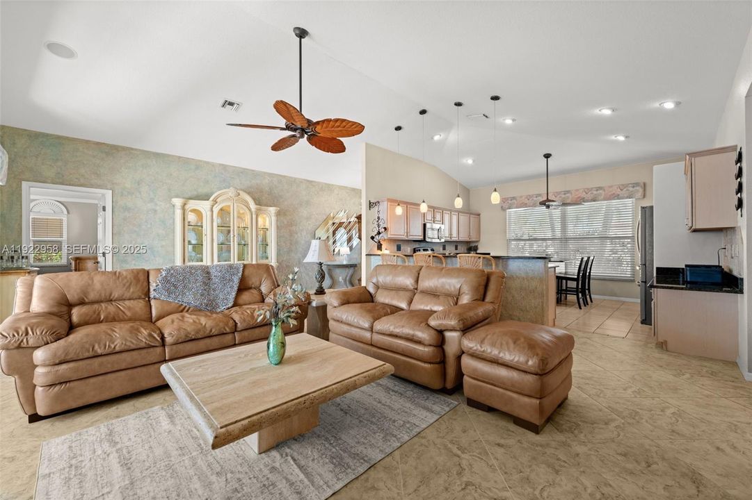 Living room looking toward the kitchen and entry