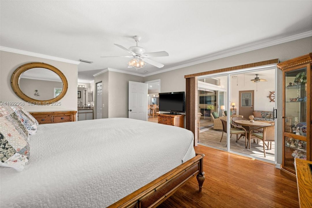 Primary Bedroom with sliding door to the lanai