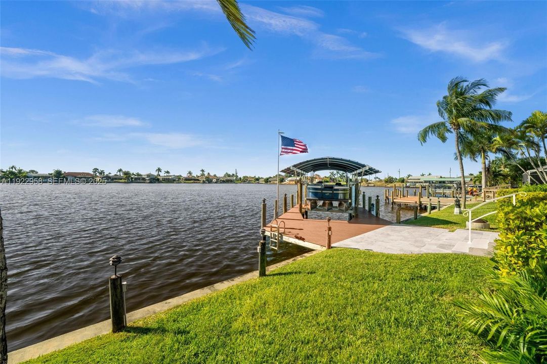 Dock and boat lift on Gulf Access Thunderbird Lake