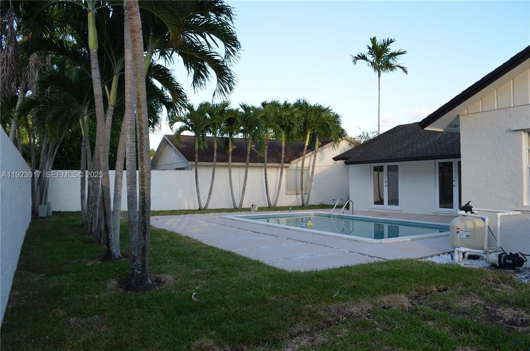 Concrete walled backyard