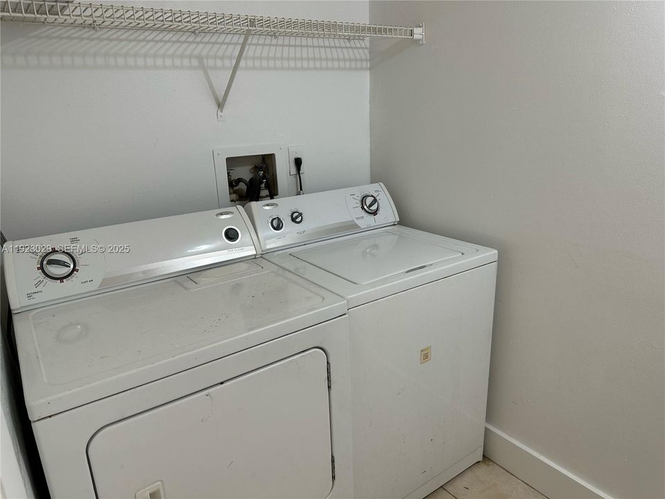Private washer and dryer inside the Apt.