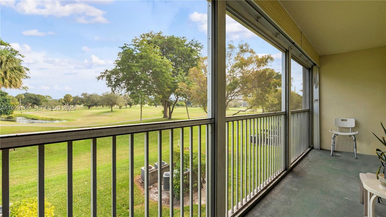 Screened in balcony with perfect view of the golf course.