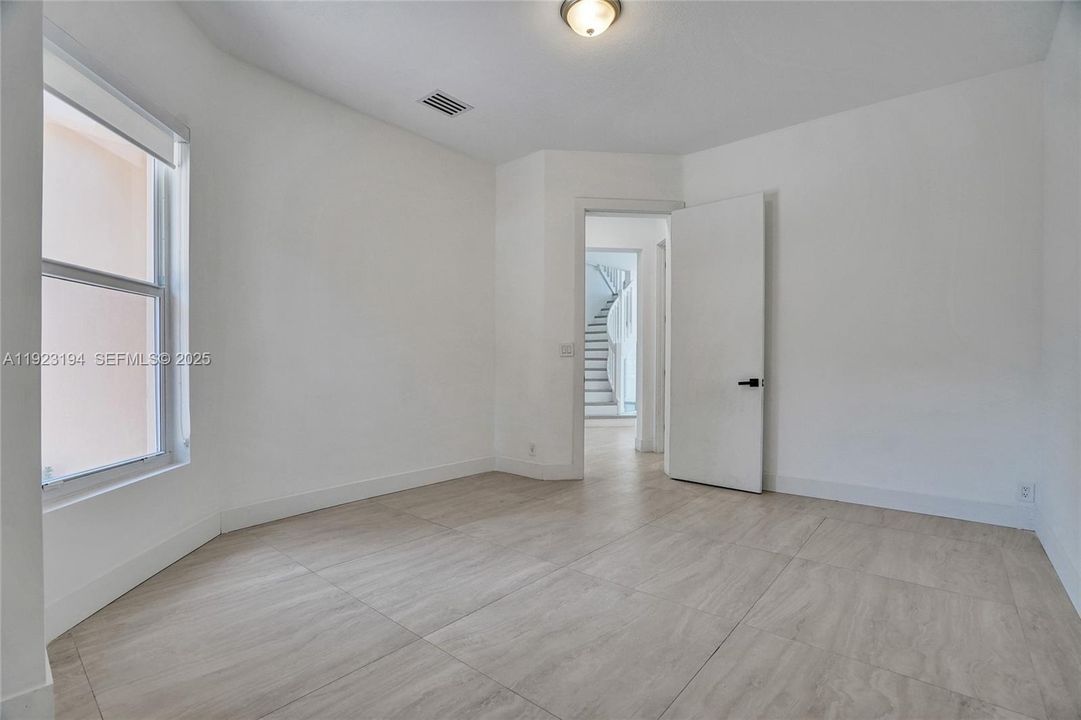 First floor bedroom/office/playroom.