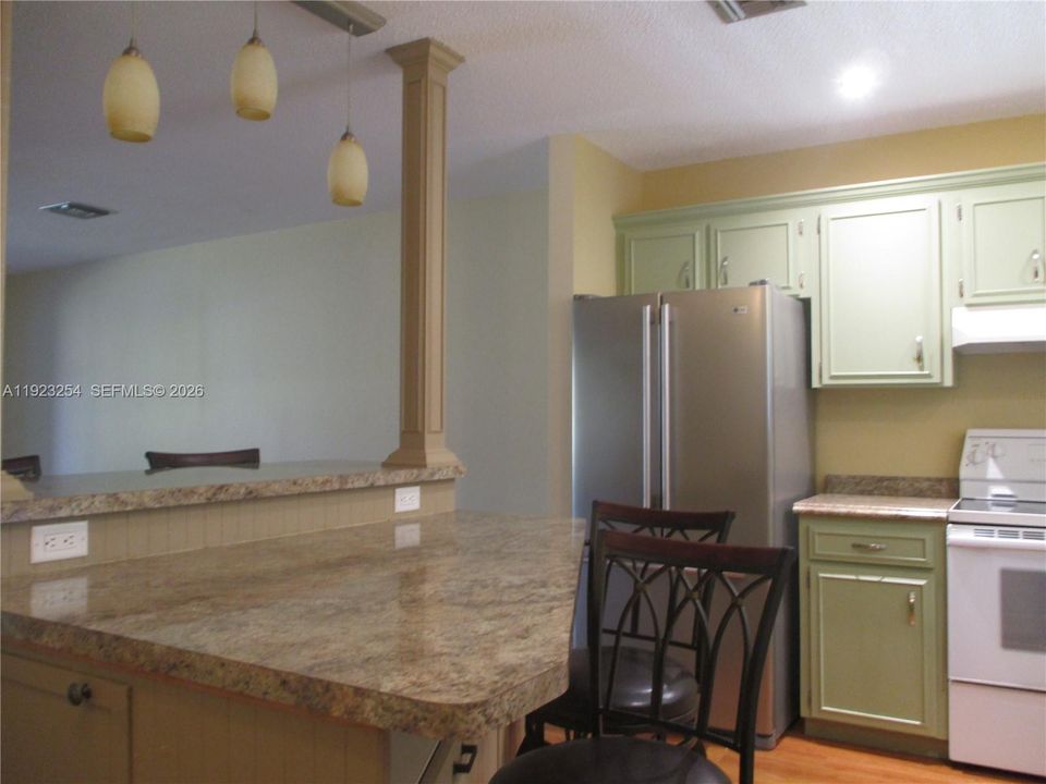 KITCHEN ISLAND WITH EXTRA STORAGE BELOW