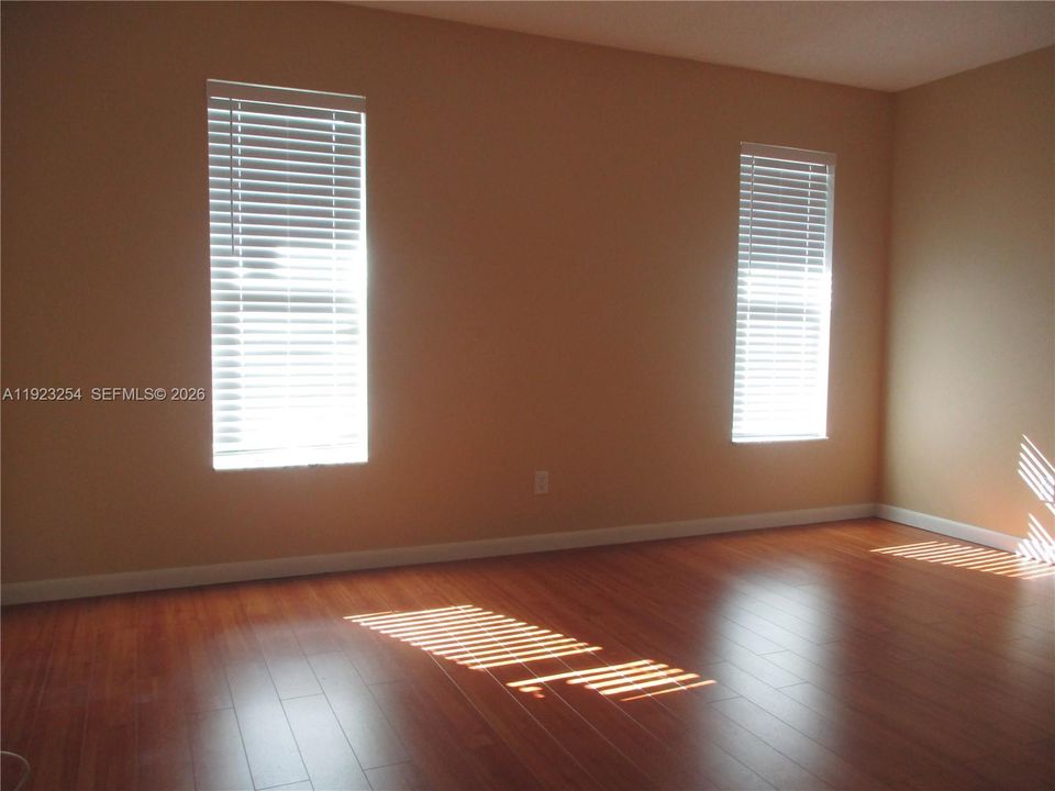 GUEST BEDROOM WITH TWO WINDOWS FOR MORNING SUN LIGHT