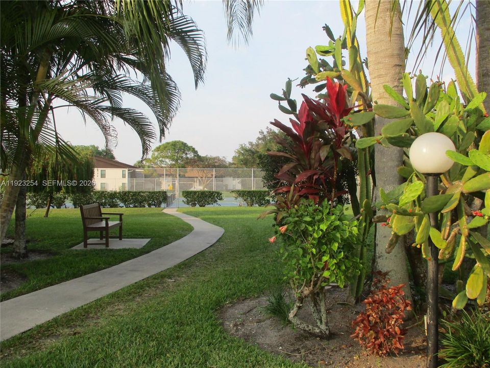 ENTRANCE TO TENNIS COURTS BY "S" BLDG.