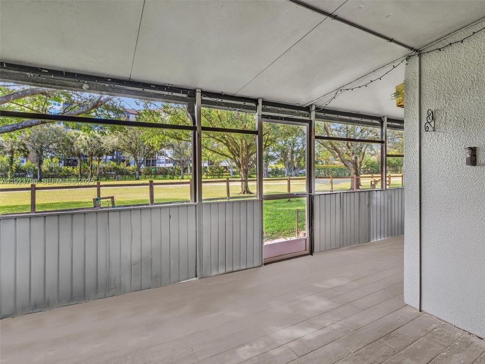 Screened Enclosed Patio, Expands the living area and opens to the Golf Course.