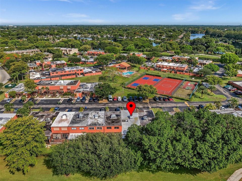 Ideally located across from the clubhouse, pool, tennis, pickleball, and basketball courts