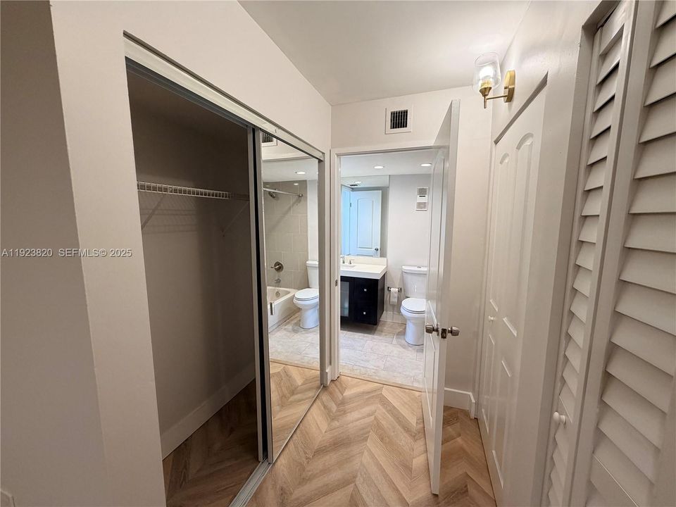 Closet bedroom hallway to bathroom