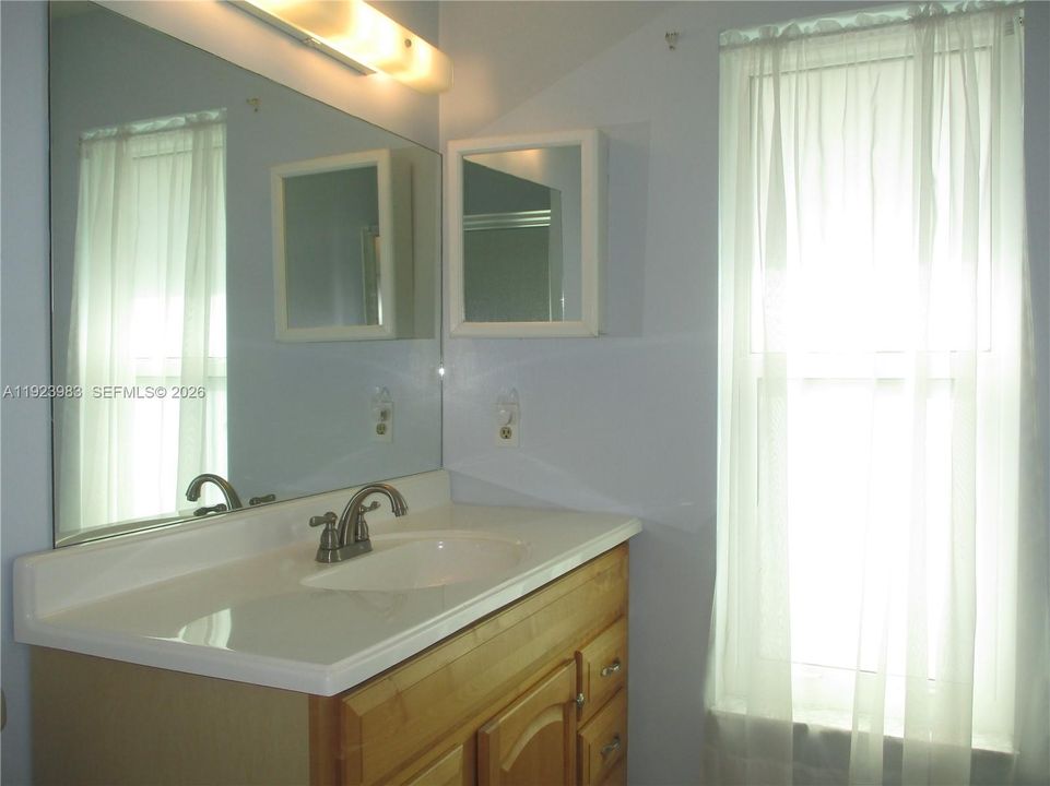 MASTER BATHROOM WITH A WINDOW FOR EXTRA LIGHT