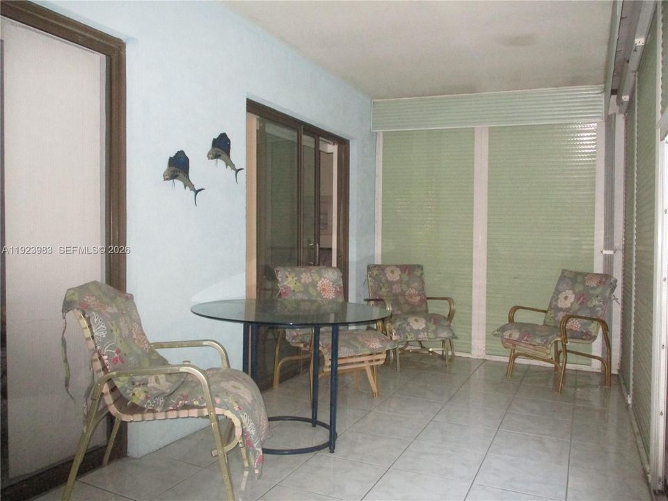 LARGE PATIO WITH PULL DOWN SHUTTERS