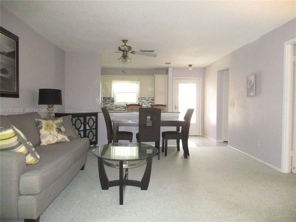 A VIEW FROM THE PATIO INTO THE LIVING AREA