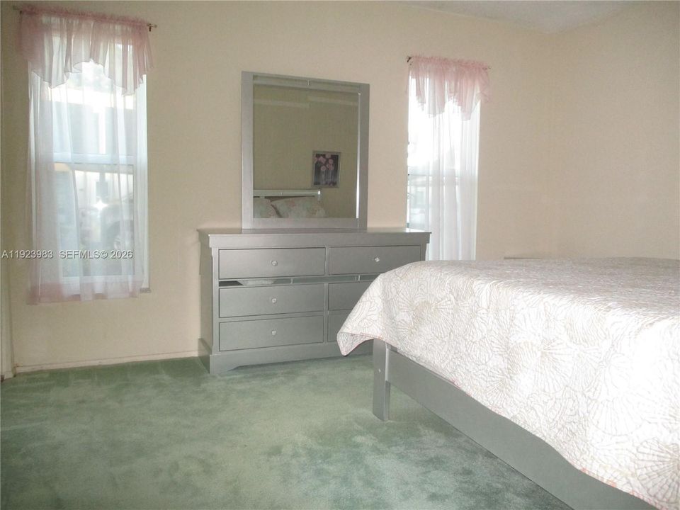 GUEST BEDROOM WITH TWO WINDOWS FOR MORNING SUN