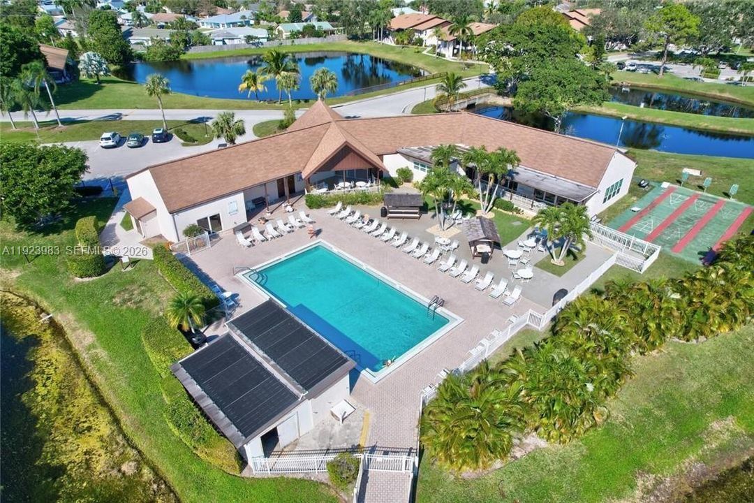 COMMUNITY ROOM, EXERCISE, SAUNA, HEATED POOL & PICNIC AREA SUROUNDED BY PONDS