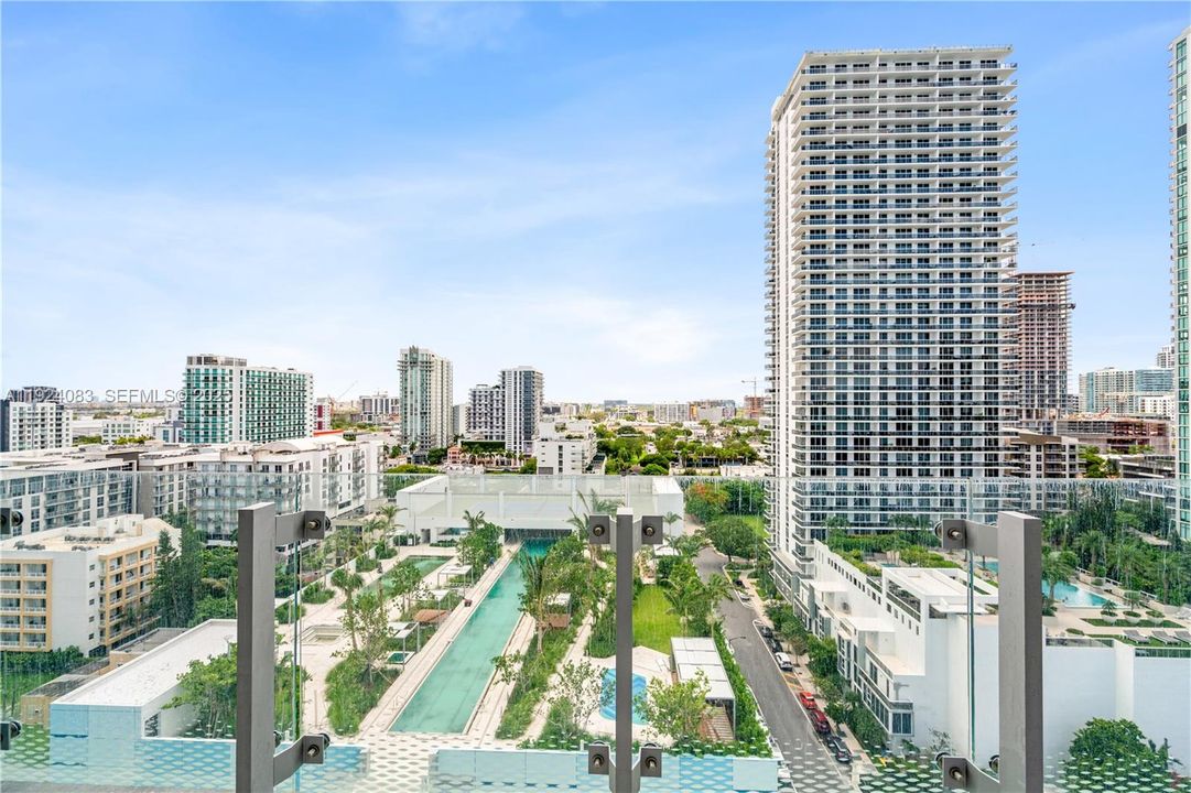 To the West. Condo swimming pool and tenis courts.