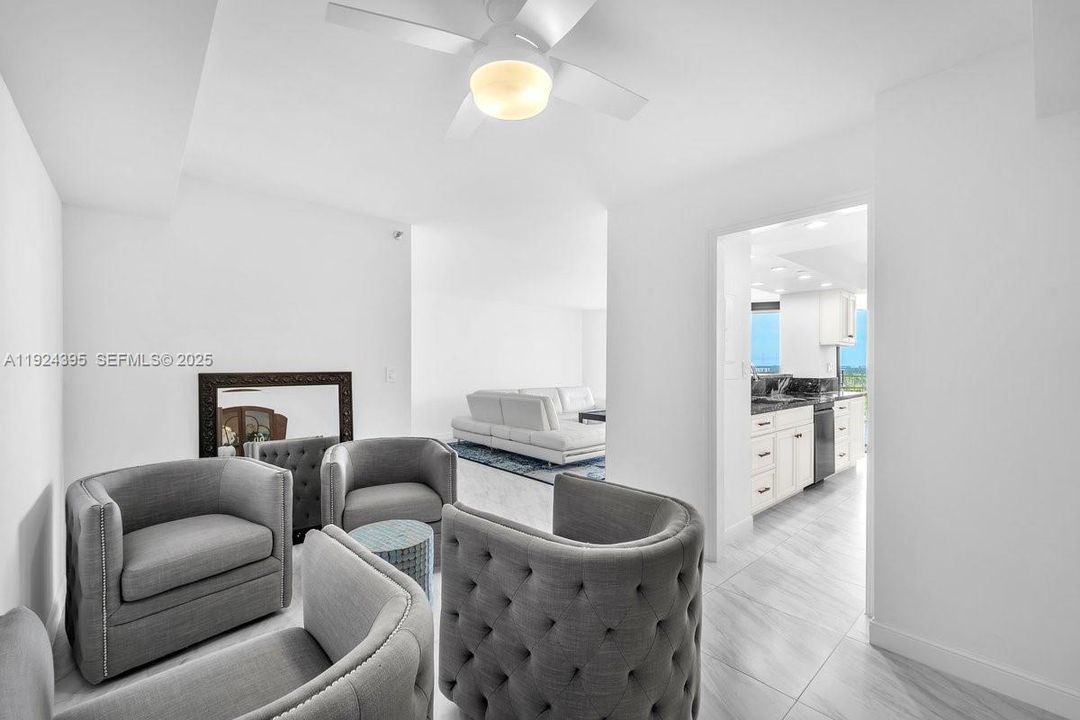 Officially the dining room off the kitchen but currently used as a sitting room