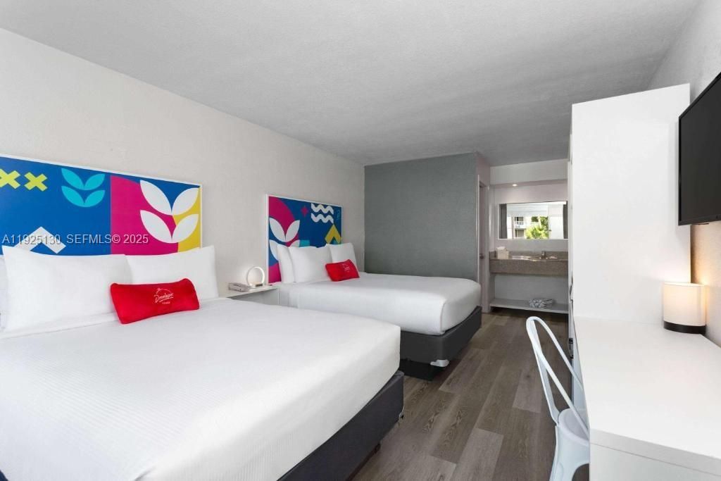 Photos are illustrative; common-area and promotional images provided by hotel operator. May not reflect the unit being sold.