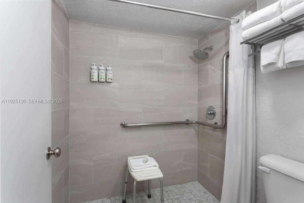 Photos are illustrative; common-area and promotional images provided by hotel operator. May not reflect the unit being sold.
