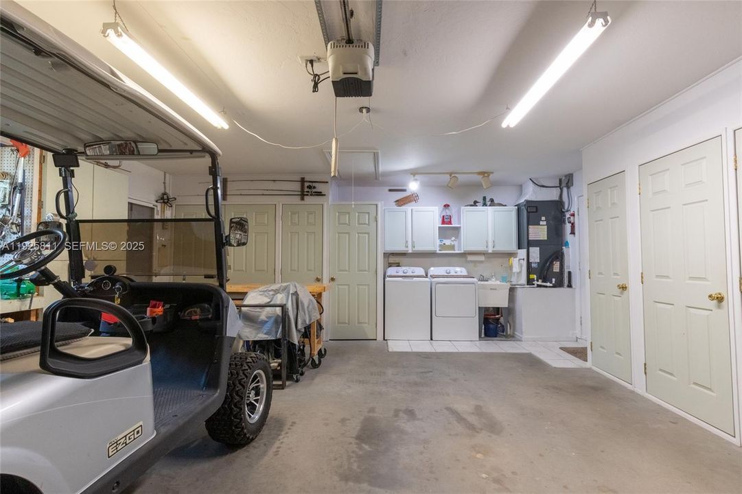 Newer washer & dryer with a laundry sink