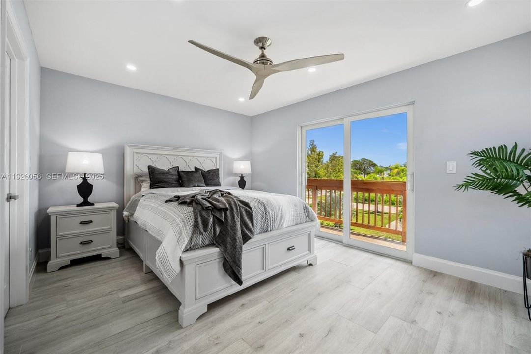 Bedroom 2 with Balcony access and Walk In closet