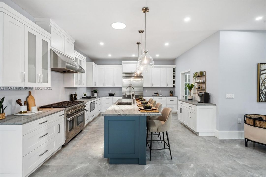 High end appliances: Wolf Range and Microwave, Sub Zero Fridge