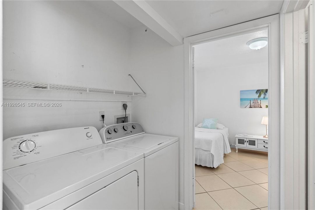 Full-size washer and dryer included.