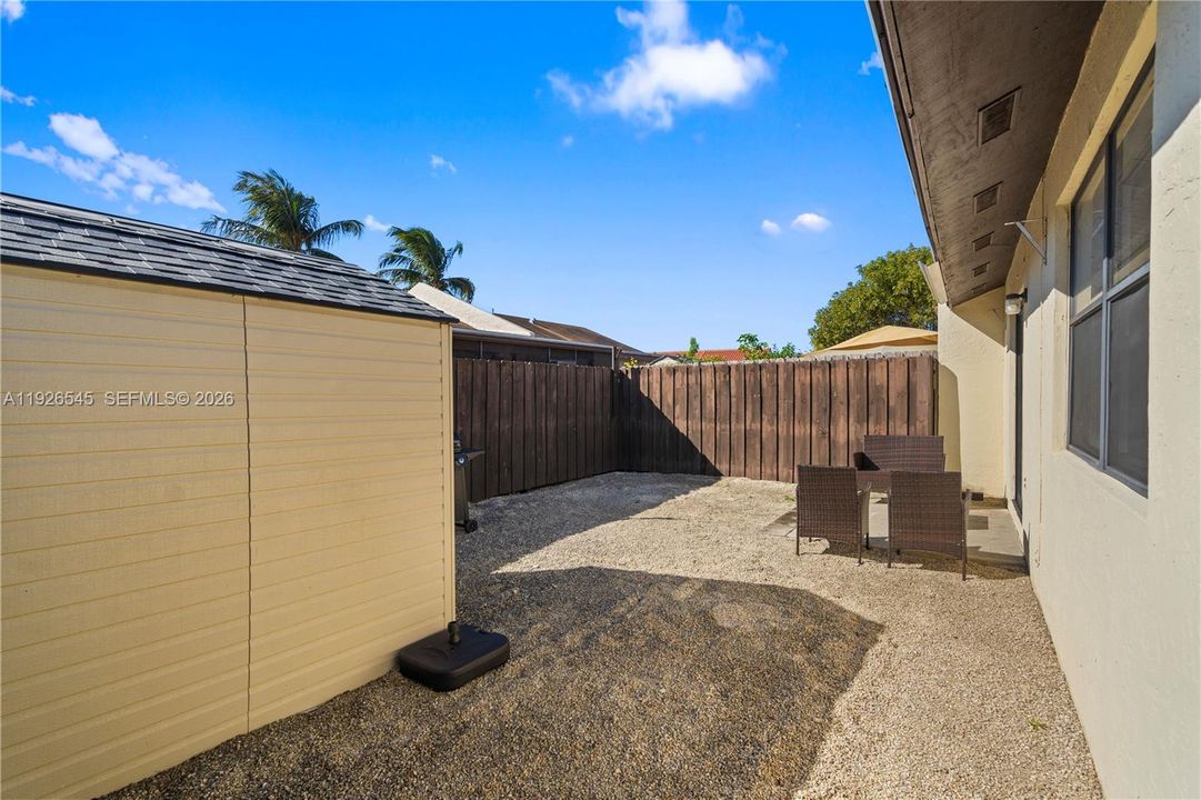 The shed stays with the home and comes included, great for storage and organization.