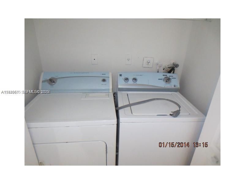 Laundry with washer and dryer.