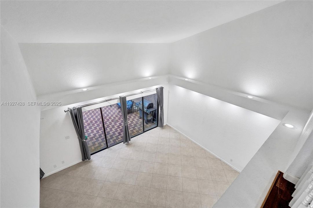 view of high ceilings and entire living area