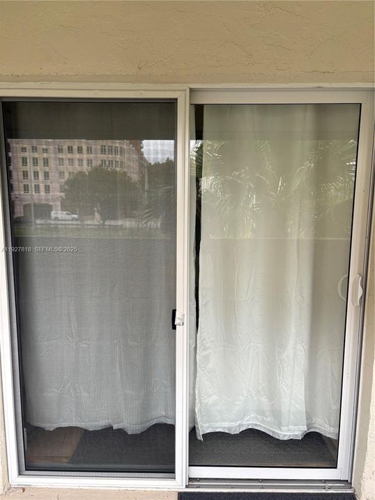 Impact glass door from 2nd bedroom to balcony