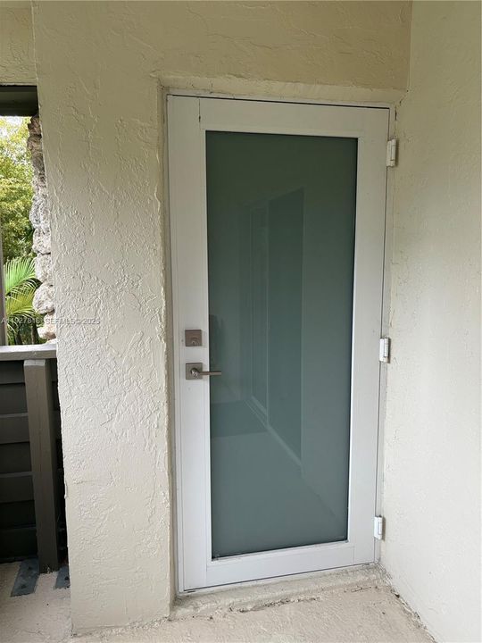 Impact glass door to balcony from master bedroom