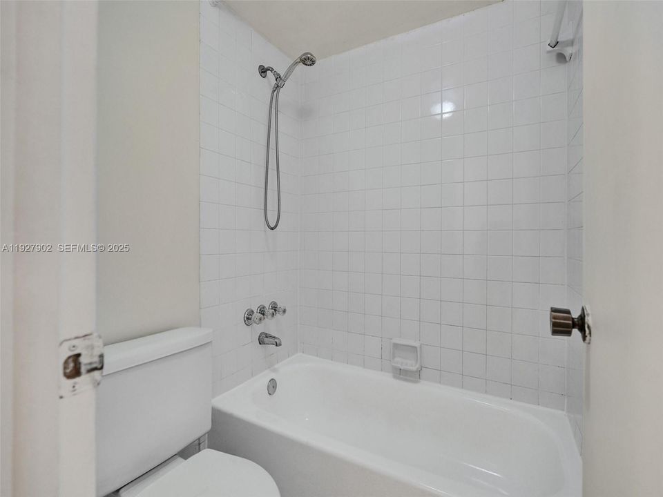 private commode and tub. Recently updated bathroom.