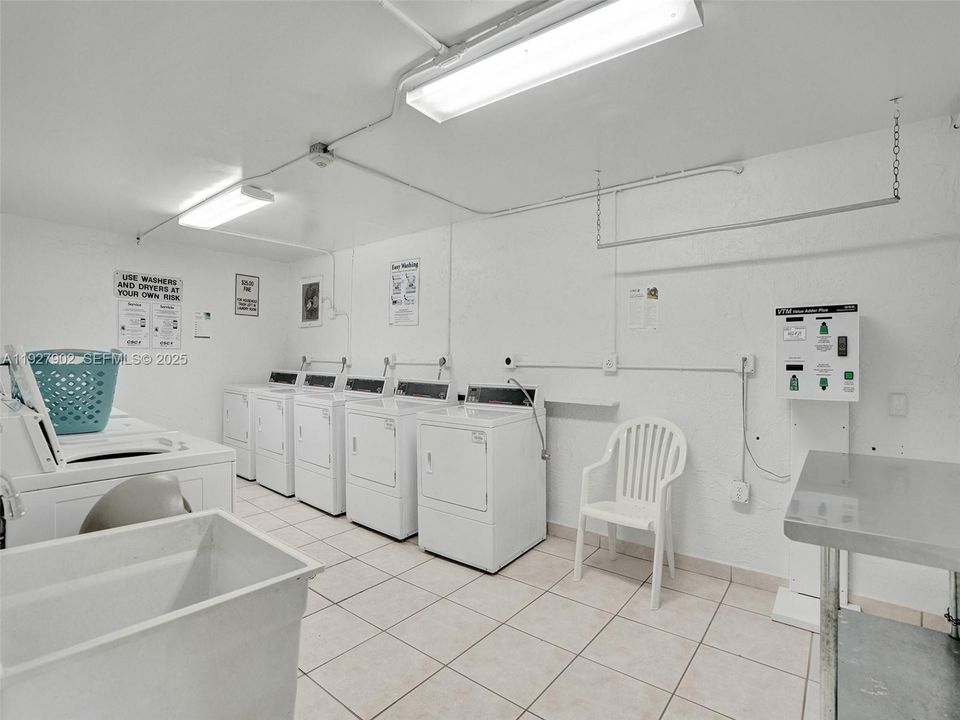 there are TWO community laundry rooms like this - however, there is a washer/dryer IN the unit too
