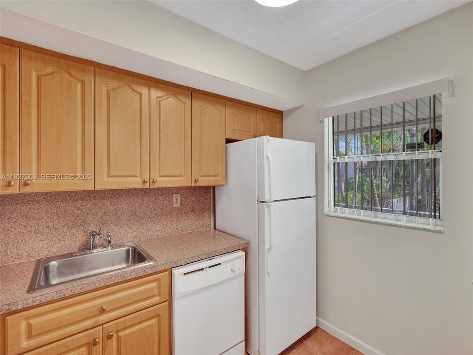 rare window in the kitchen! It's nice to have and not all units have one.