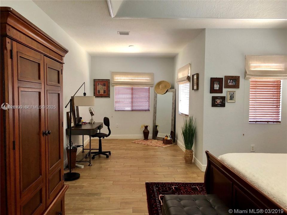 Primary bedroom and sitting area