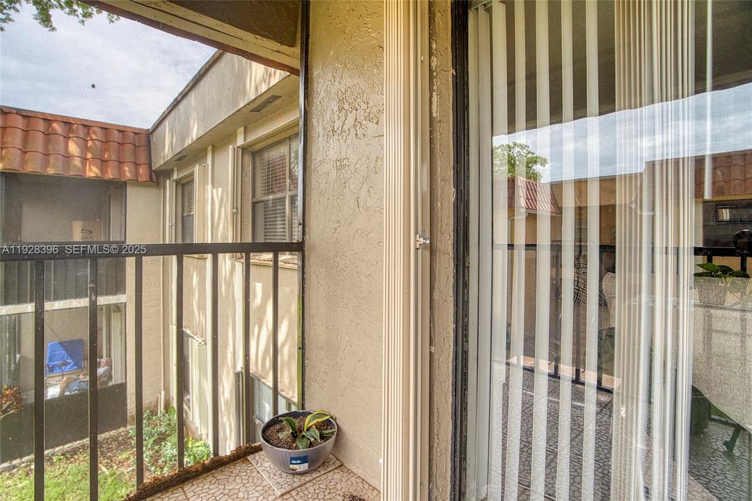 Accordion hurricane shutters