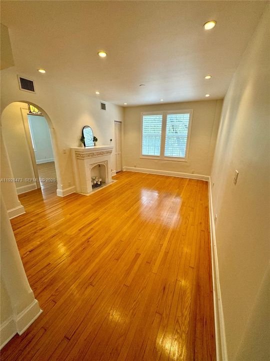 Spacious Living room space with recessed lighting