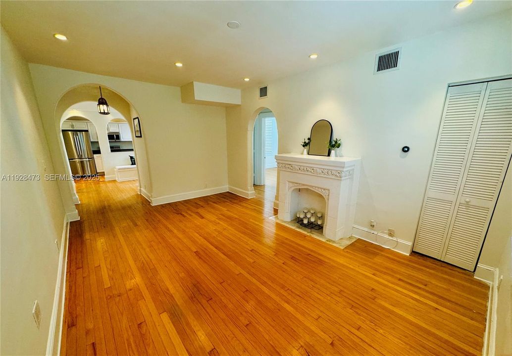 Beautiful wood floors & recessed lighting through out the unit.
