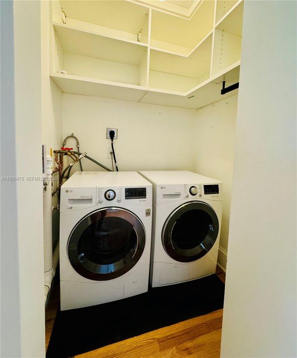 LG Washer and dryer in the unit with plenty of extra storage space!