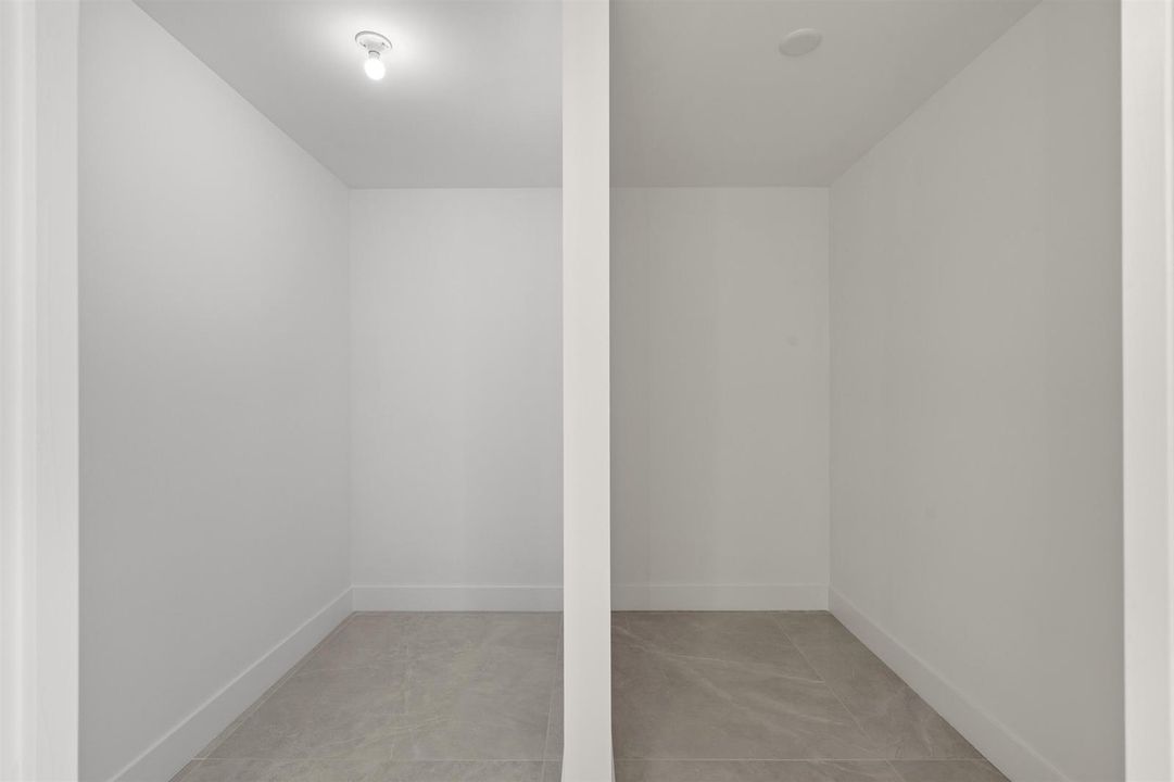 PRIMARY WALK IN CLOSET