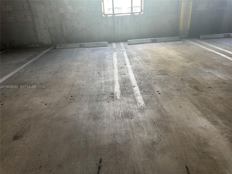 Assigned Parking Spaces 510 and 511 directly outside the private elevator door.