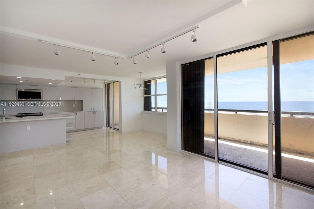 Living room, dining area, open kitchen