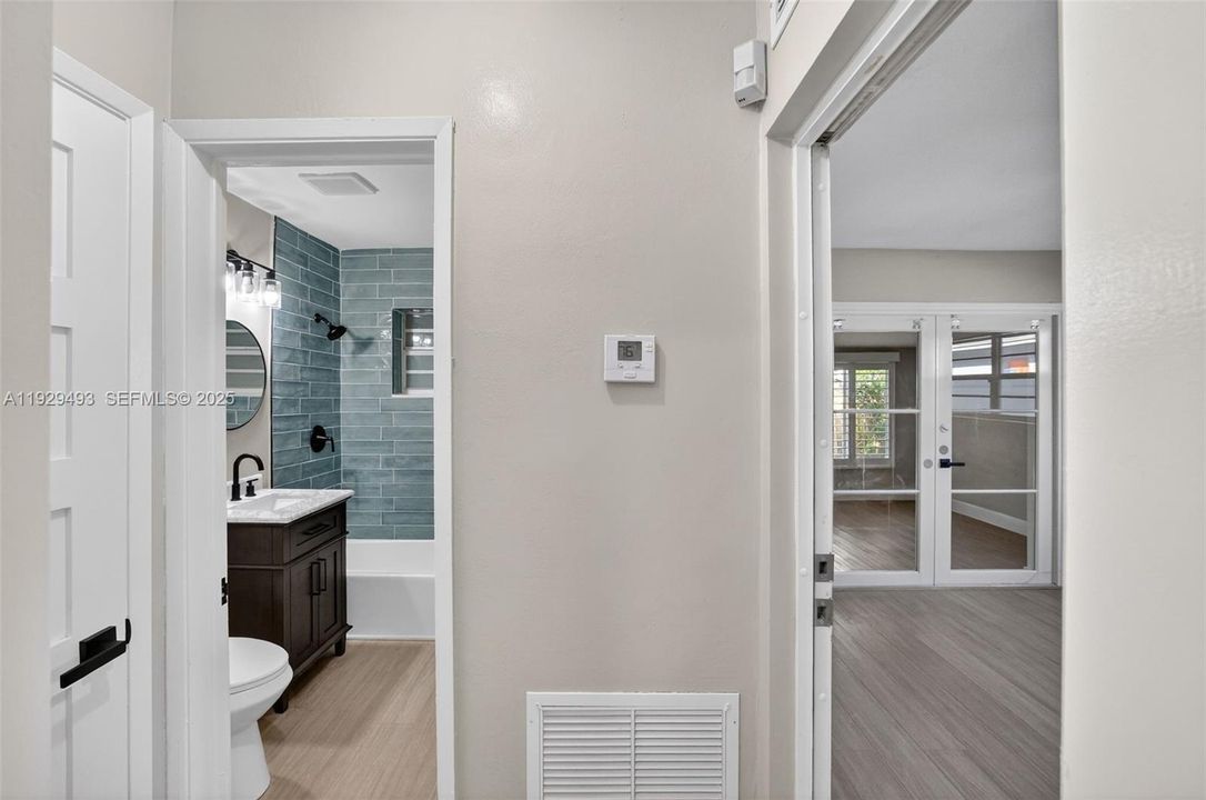 Unit 2 HALL Bathroom and entry to 2nd bedroom