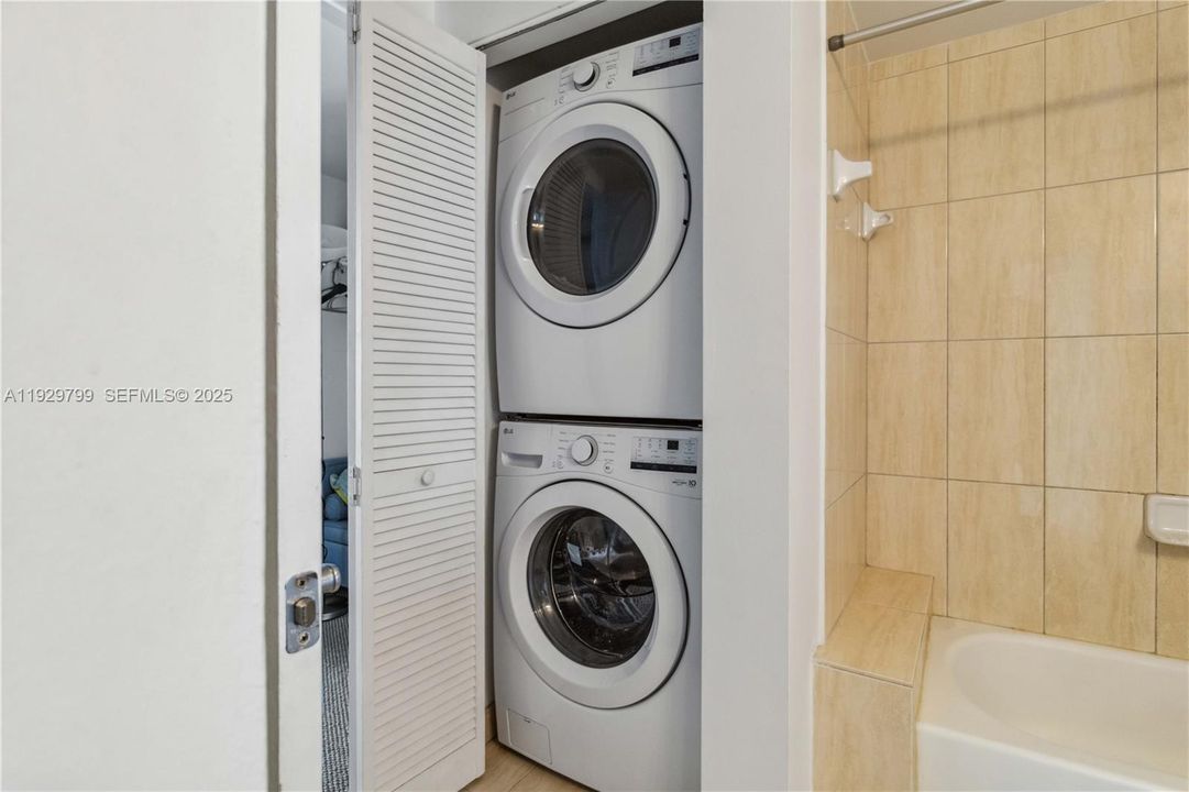 In-unit washer and dryer for ultimate convenience in this luxury Miami condo.