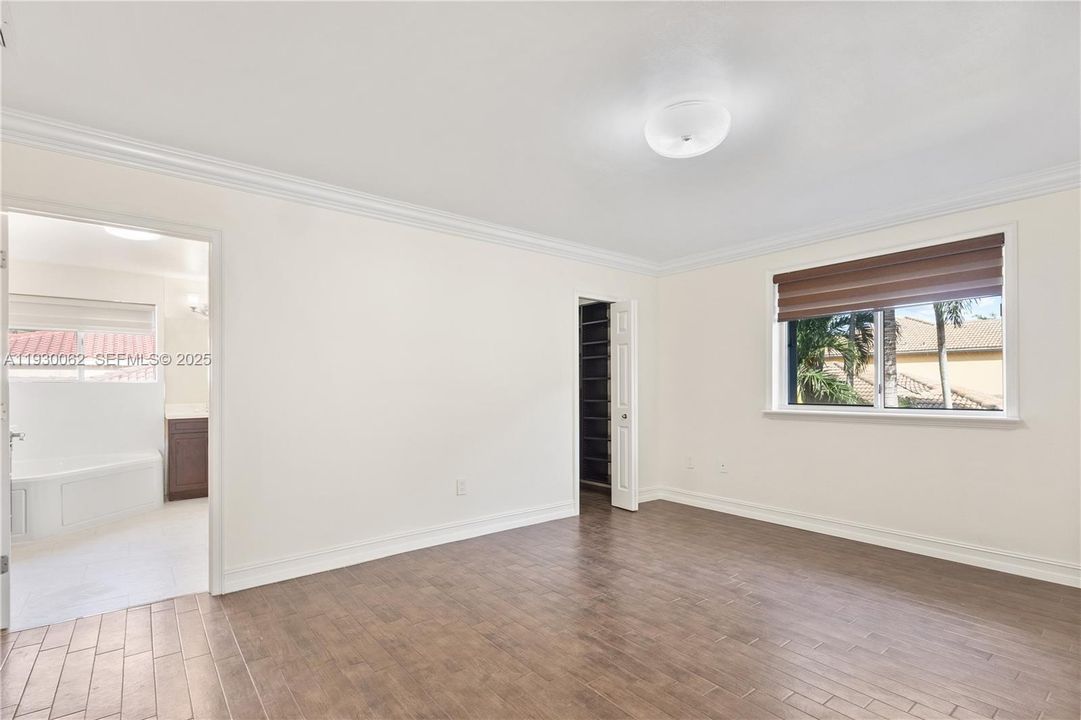 From primary bedroom to primary bathroom and walk-in closet