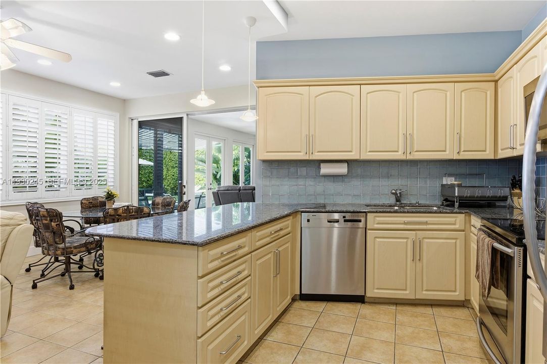 KITCHEN W/ BLUE GRANITE COUNTER TOP